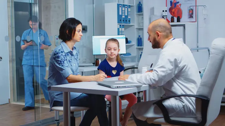 imgi 21 pediatrician writing prescription kid after examination healthcare practitioner ph