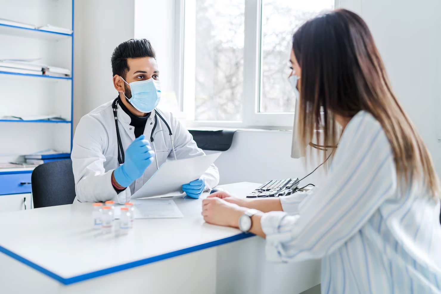 imgi 30 indian doctor receives patient tells him about results tests medicine health 496169